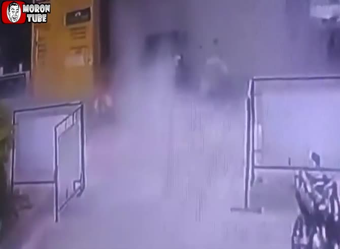 Video :When a motorbike bomb detonates, two individuals are almost killed